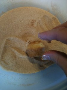 Lightly rolling in sugar mixture